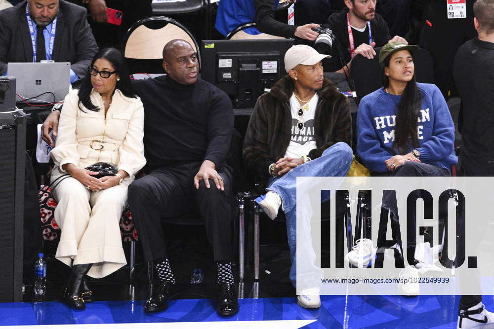 Magic Johnson et sa femme Cookie Pharrell Williams et sa femme Helen ...