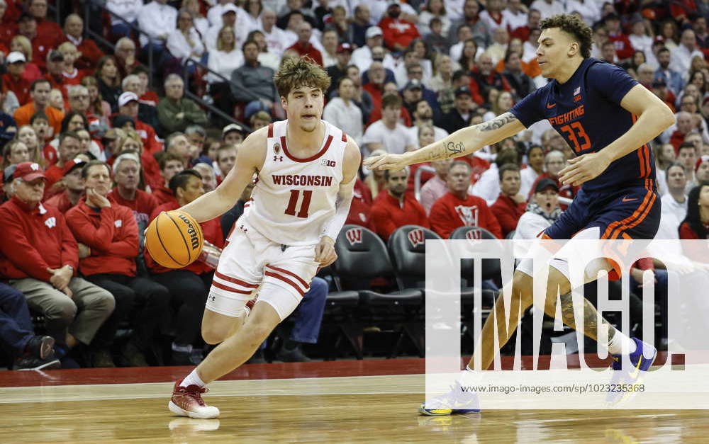 January 28, 2023: Wisconsin Badgers guard Max Klesmit (11) drives in ...