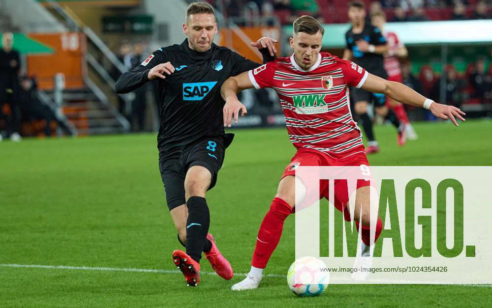 Pavel Kaderabek TSG 1899 Hoffenheim and Ermedin Demirovic FC Augsburg v ...