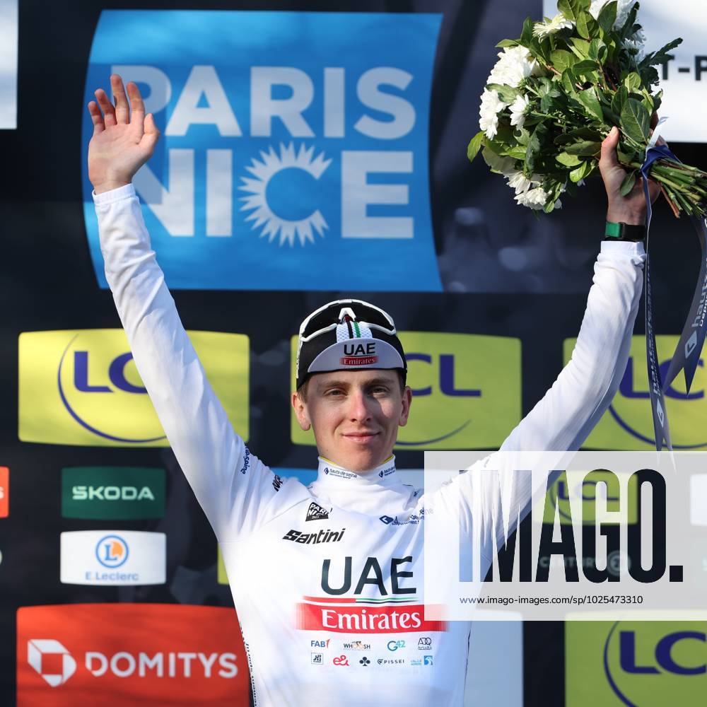 Slovenian Tadej Pogacar of UAE Team Emirates celebrates on the podium ...