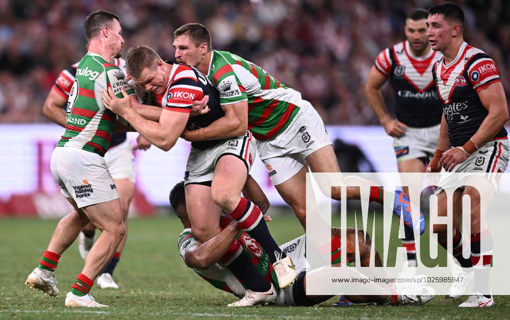 NRL ROOSTERS RABBITOHS, Lindsay Collins of the Roosters is tackled by ...