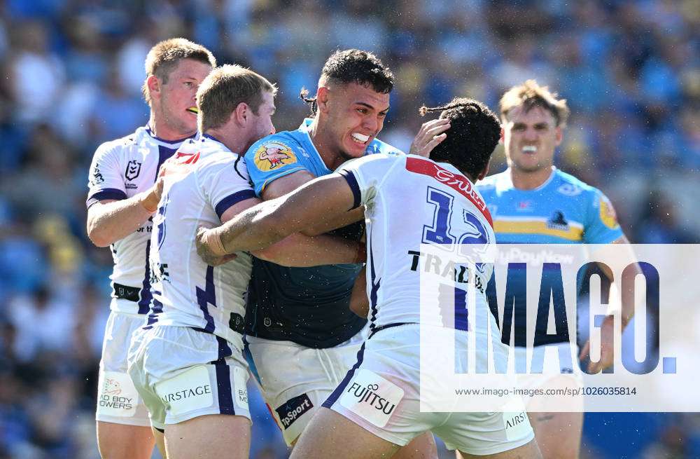 NRL TITANS STORM, Iszac Faasuamaleaui of the Titans (centre) during the ...