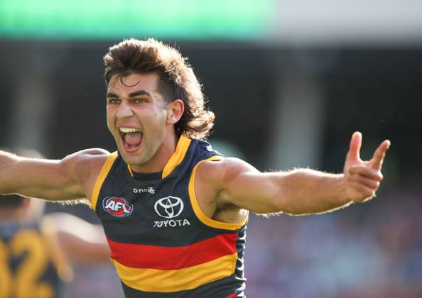 AFL CROWS TIGERS, Josh Rachele of the Crows celebrates a goal with team ...