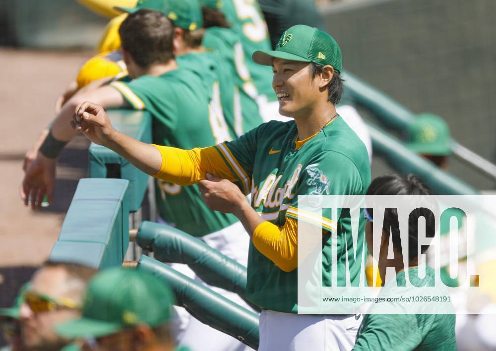 Shintaro Fujinami of the Oakland Athletics pitches against the Milwaukee  Brewers in a spring training game