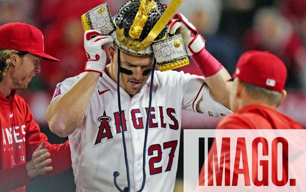 Mike Trout of the Los Angeles Angels prepares to put on a samurai