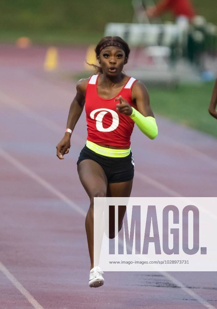 Syndication: The Tennessean Kymora-Lee Williams of Overton wins the girls 100 meter dash during the