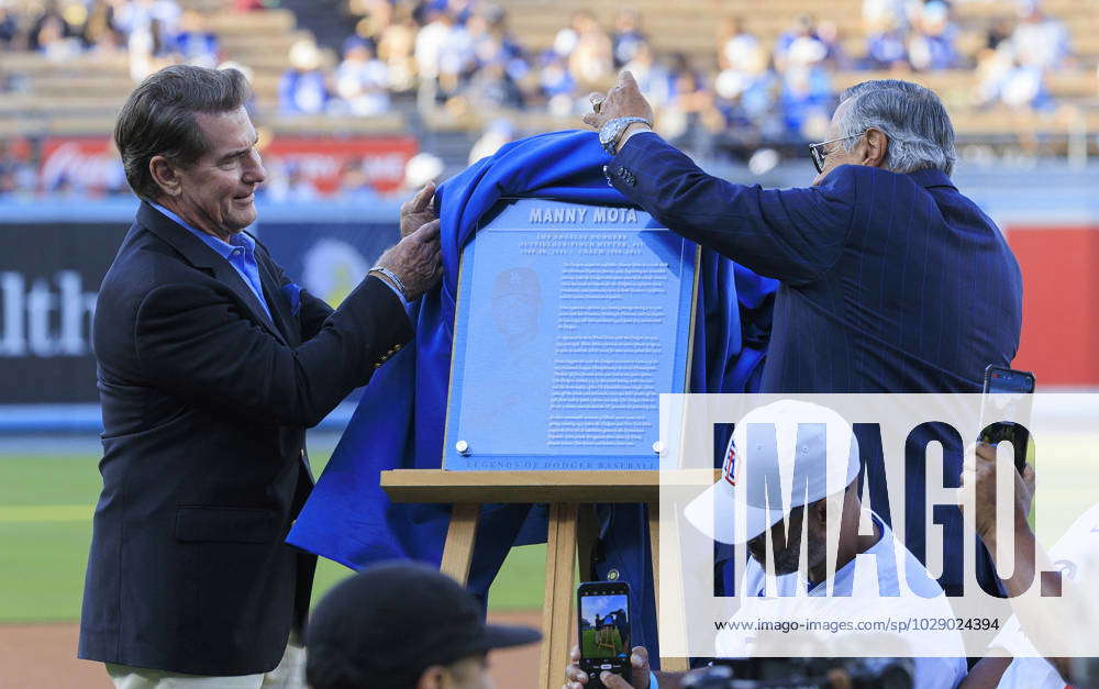 Los Angeles, United States . 01st May, 2023. Los Angeles Dodgers legend  Steve Garvey and former broadcaster Jaime Jarrin presenting Manny Mota and  family with a plaque during his induction ceremony into