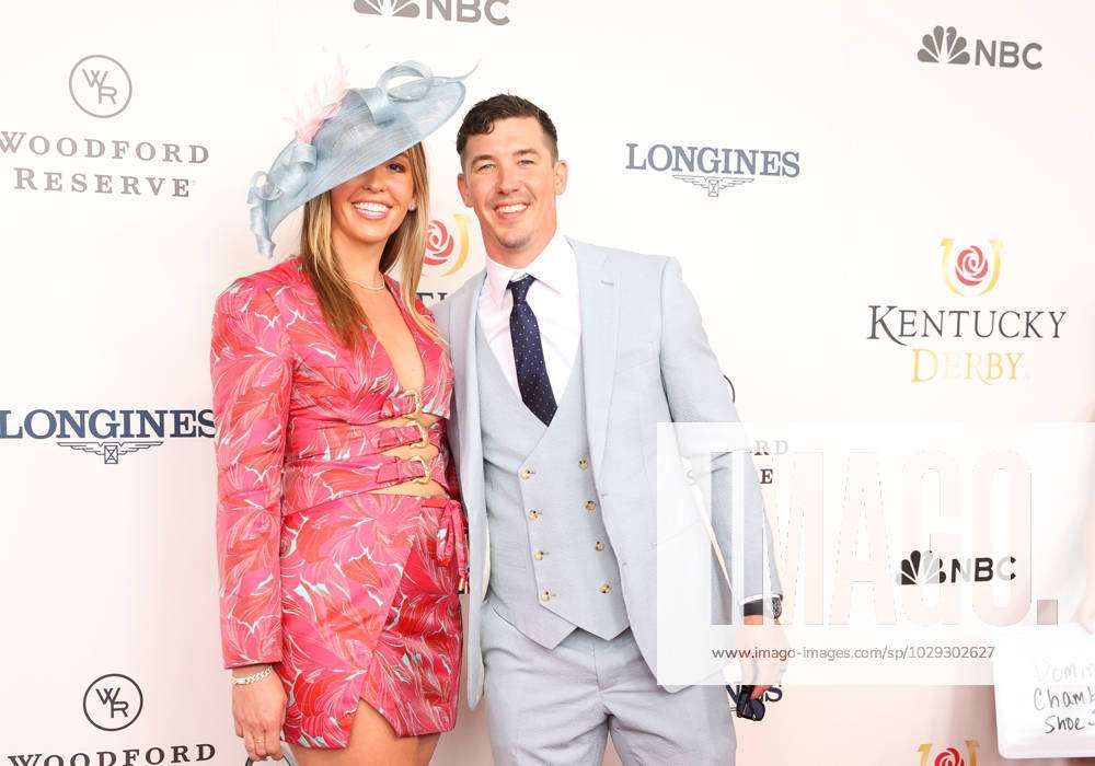 LOUISVILLE, KY - MAY 06: Los Angeles Dodgers pitcher Walker Buehler and wife  McKenzie walk the red