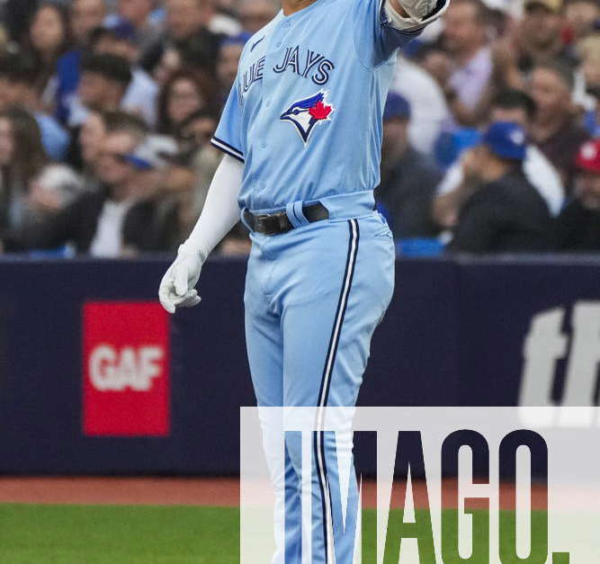 Toronto, Canada. 27th June, 2023. Toronto Blue Jays' Whit Merrifield (15)  celebrates a single against the San Francisco Giants during second inning  MLB Interleague baseball action in Toronto on Tuesday, June 27