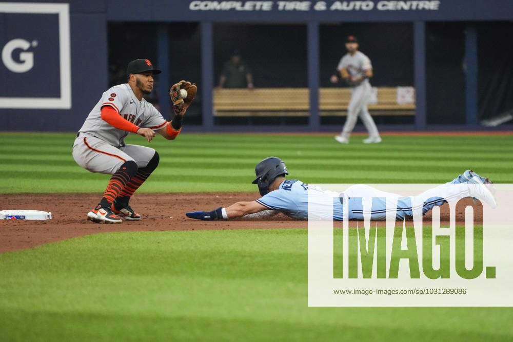 Toronto, Canada. 27th June, 2023. Toronto Blue Jays' Whit Merrifield (15)  celebrates a single against the San Francisco Giants during second inning  MLB Interleague baseball action in Toronto on Tuesday, June 27