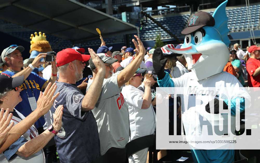 The Miami Marlins mascot, Billy the Marlin, high fives fans prior to the  start of the 2023 MLB