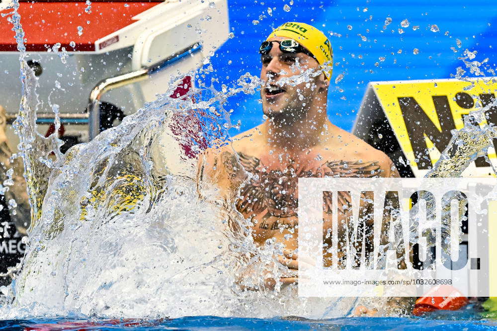 Kyle Chalmers of Australia celebrates after winning the gold medal in