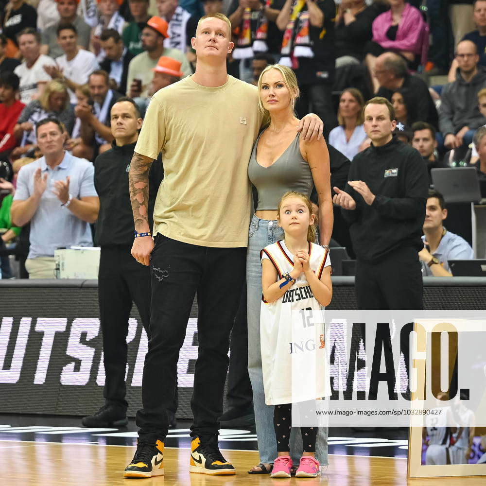 Robin Benzing, former national player, with his wife and daughter at his  farewell Germany vs