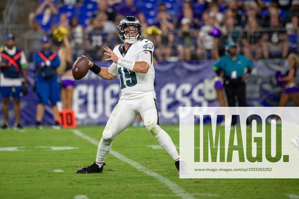 BALTIMORE, MD - AUGUST 12: Philadelphia Eagles quarterback Ian Book (19)  passes the ball during an N