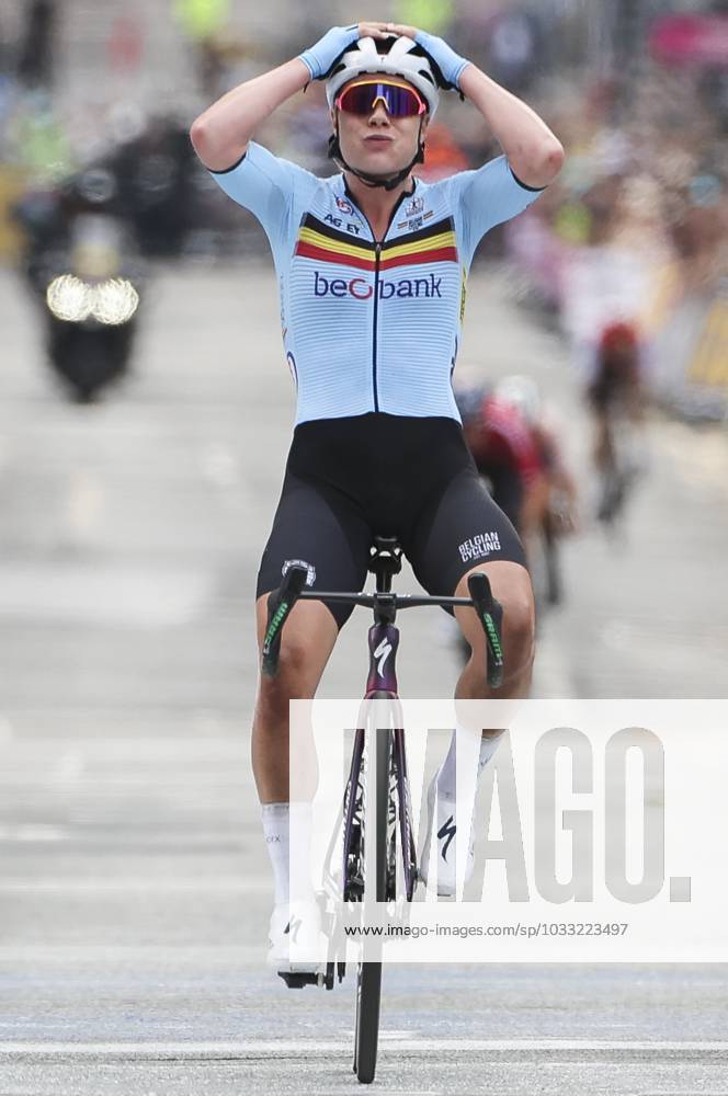 Belgian Lotte Kopecky of SD Worx celebrates as she crosses the