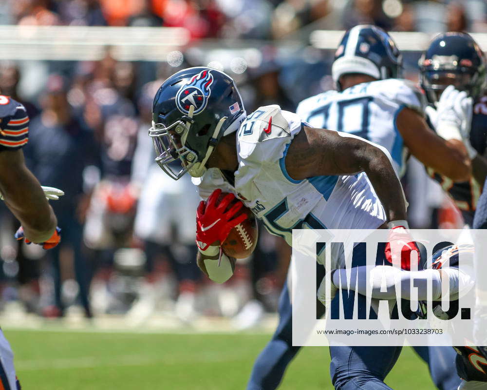 Tennessee Titans running back Hassan Haskins (25) runs during an