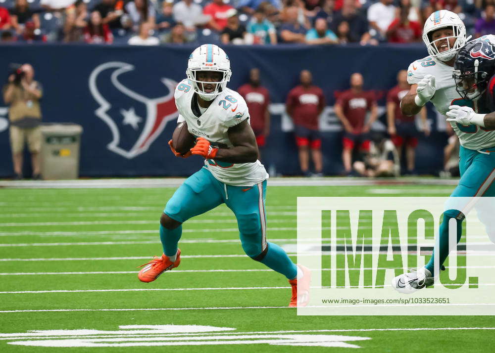 HOUSTON, TX - AUGUST 19: Miami Dolphins running back Salvon Ahmed (26)  carries the ball in the