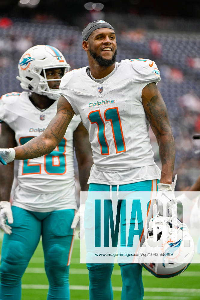 Miami Dolphins wide receiver Cedrick Wilson Jr. (11) warms up before an NFL  preseason football game against the Houston Texans, Saturday, Aug. 19,  2023, in Houston. (AP Photo/Tyler Kaufman Stock Photo - Alamy