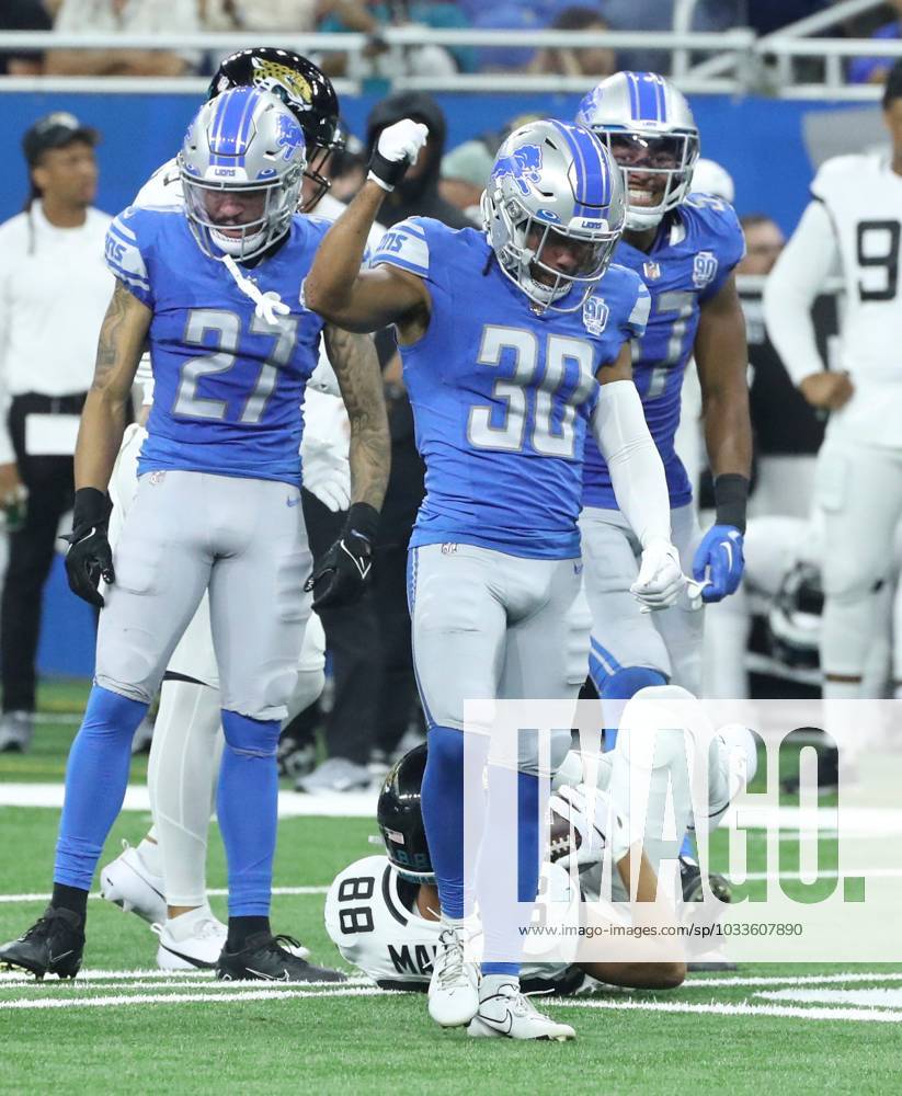 Detroit Lions cornerback Khalil Dorsey (30) returns a kick during