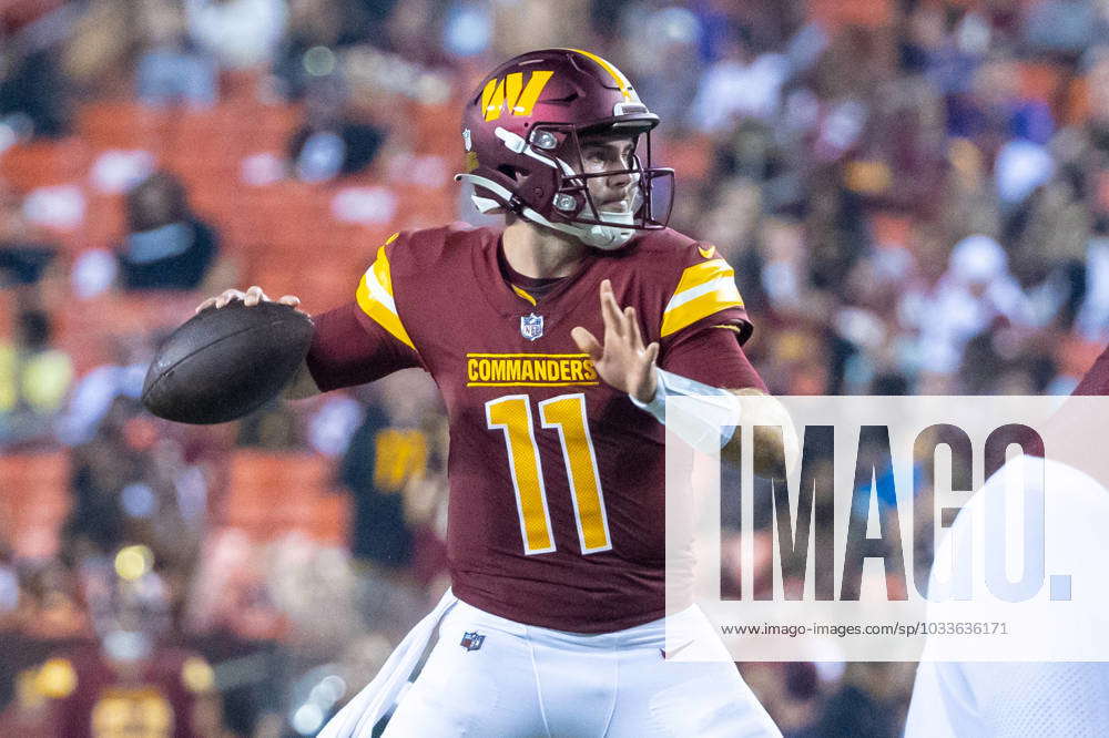 Landover, MD, USA - August 21, 2023 : Washington Commanders quarterback  Jake Fromm (11) throws the p