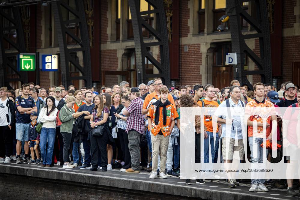 Amsterdam Crowds At Amsterdam Central Station Of Visitors Going To The F Grand Prix In