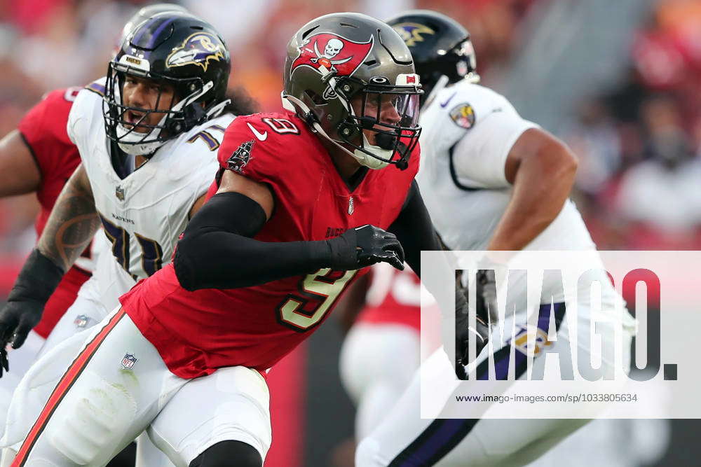 TAMPA, FL - DECEMBER 18: Tampa Bay Buccaneers linebacker Joe Tryon-Shoyinka  (9) rushes the passer du