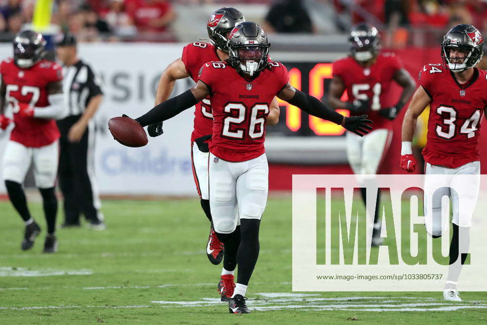 Tampa Bay Buccaneers safety Kaevon Merriweather (26) defends in the  secondary during an NFL preseason football game against the Baltimore Ravens,  Saturday, Aug. 26, 2023, in Tampa, Fla. (AP Photo/Peter Joneleit Stock