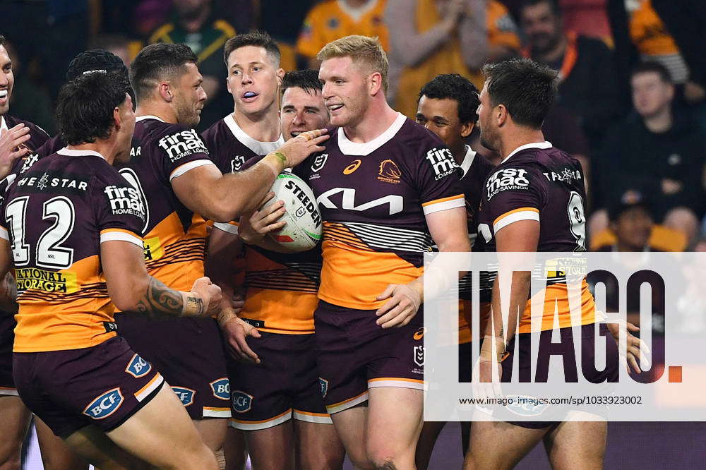 NRL BRONCOS STORM, Tom Flegler (centre, right) of the Broncos scores a ...