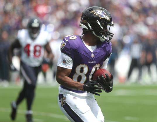 Baltimore Ravens tight end Isaiah Likely (80) in action during the