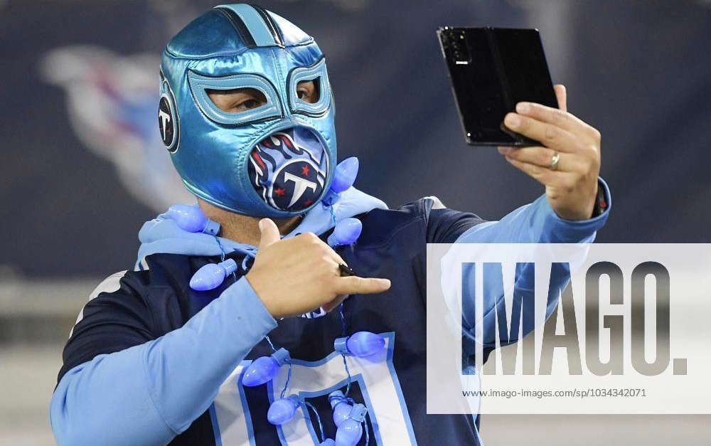 Syndication: The Tennessean A Tennessee Titans fan takes a selfie as the  team warmups for their