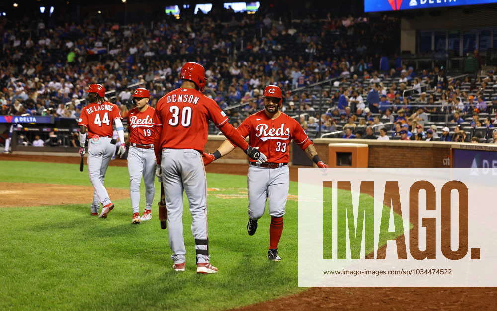 Cincinnati Reds' Will Benson (30) celebrates with Christian