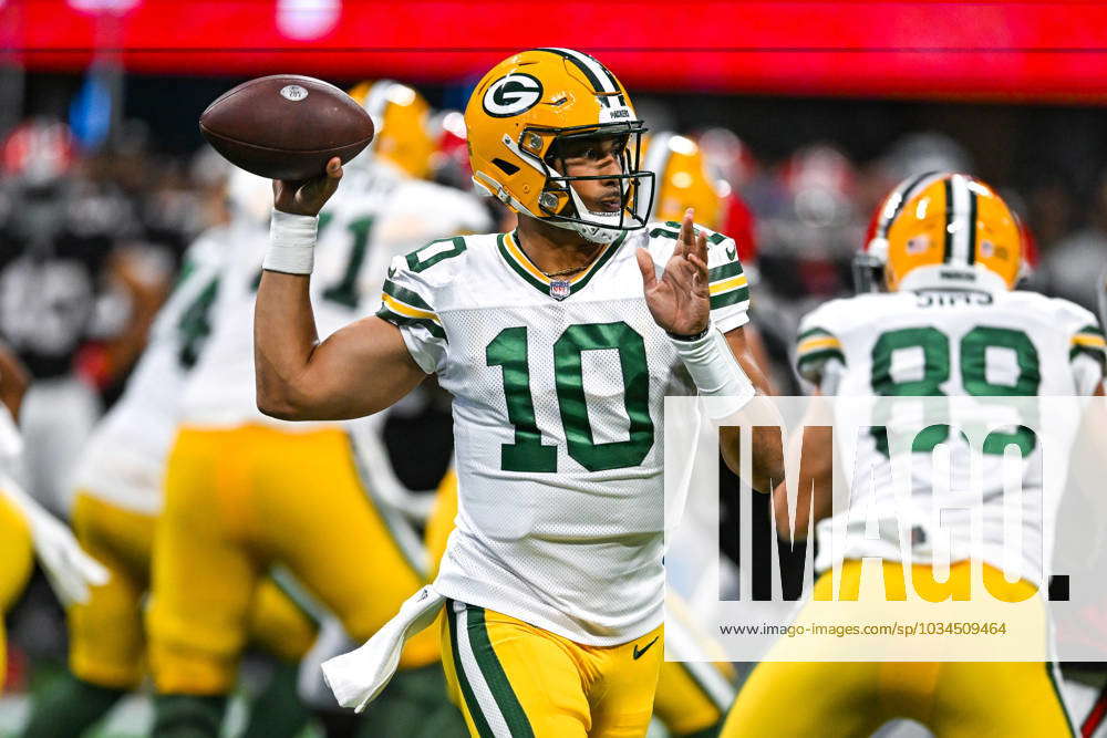 Green Bay Packers quarterback Jordan Love (10) drops back to pass