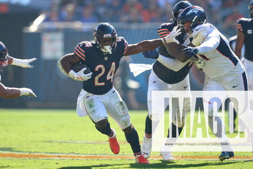 December 24, 2022 - Chicago Bears running back Khalil Herbert (24) takes  off with the ball during NFL football game versus the Buffalo Bills in  Chicago, IL Stock Photo - Alamy