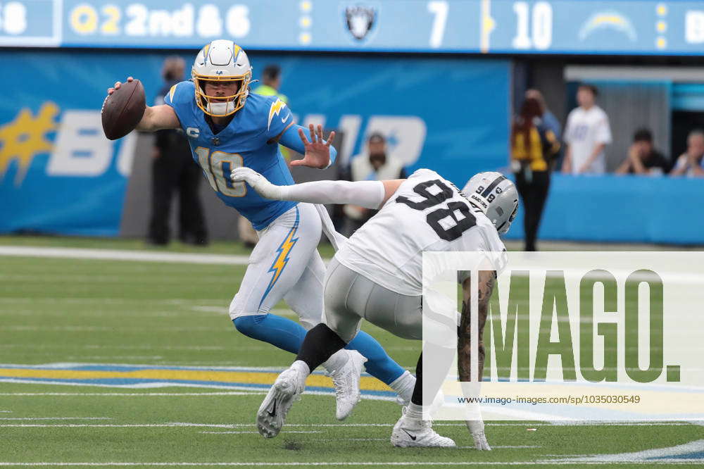 Los Angeles Chargers quarterback Justin Herbert warms up before an NFL  football game against the Cleveland Browns Sunday, Oct. 10, 2021, in  Inglewood, Calif. (AP Photo/Gregory Bull Stock Photo - Alamy