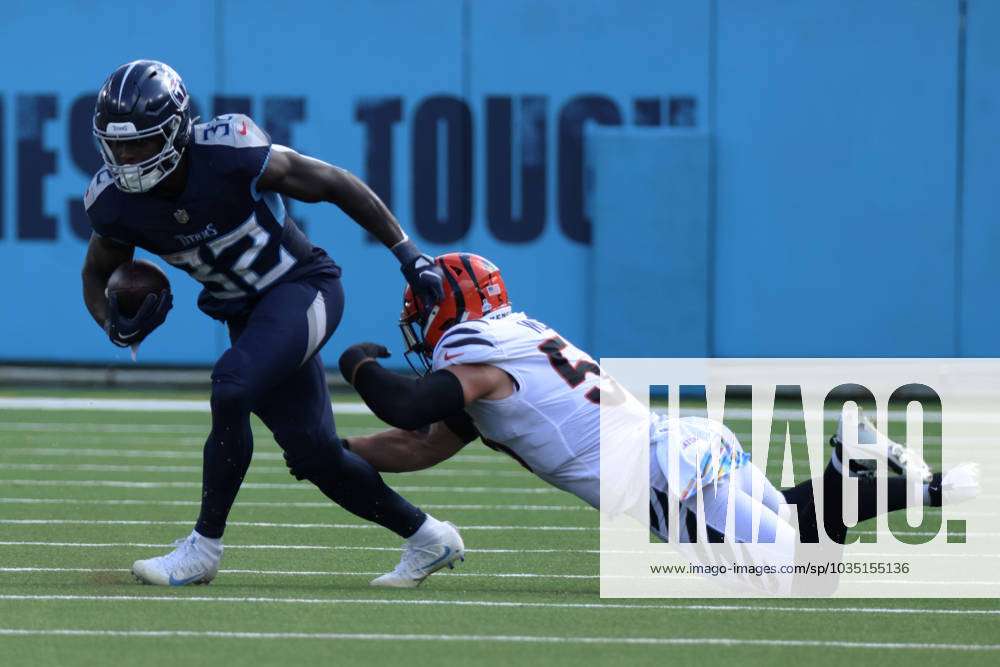 Tennessee Titans running back Tyjae Spears (32) is tackled by