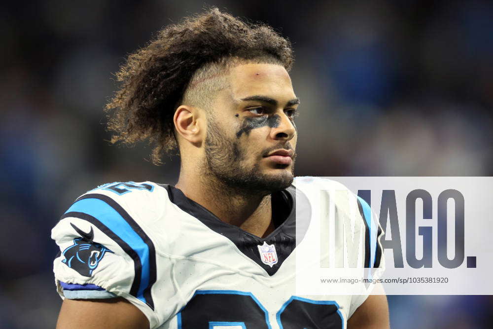 Tommy Tremble of the Carolina Panthers walks off the field