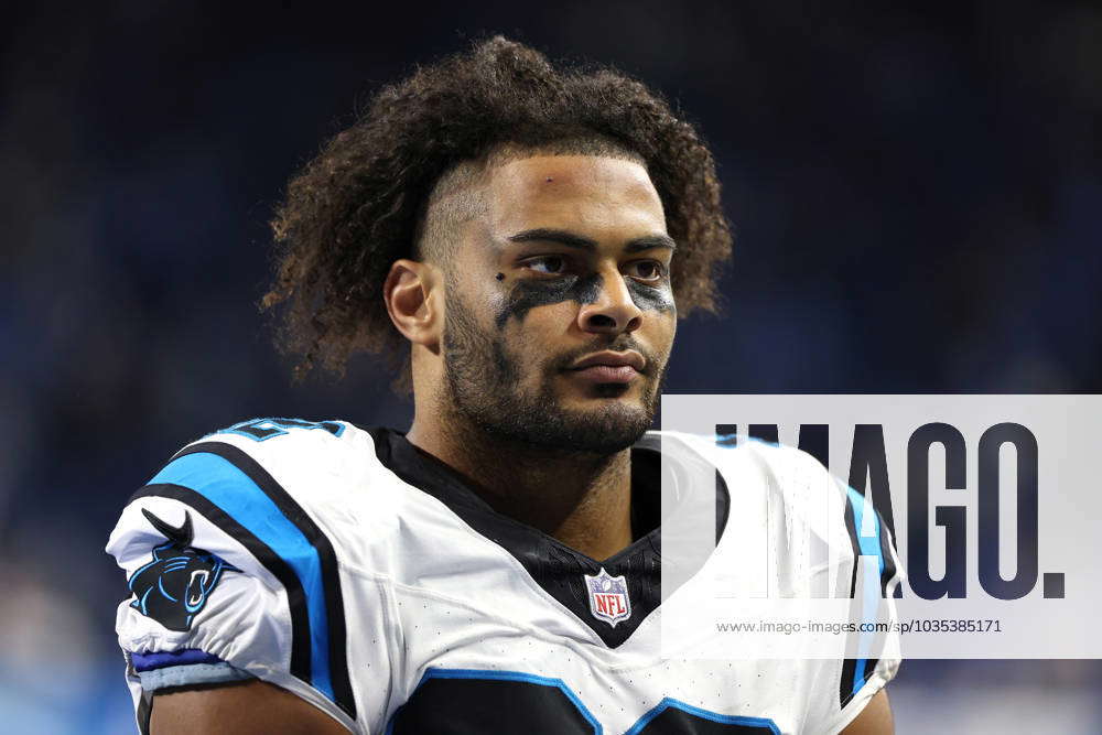 Tommy Tremble of the Carolina Panthers walks off the field