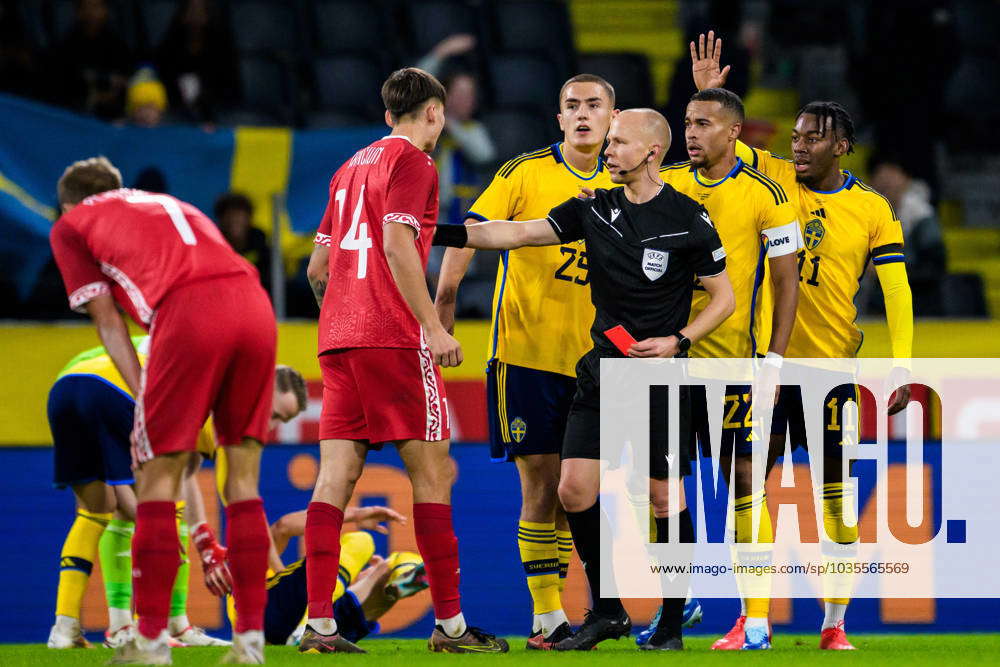 231012 Artur Craciun of Moldova receives a red card during the