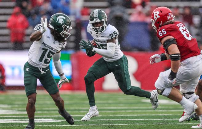 Chance Rucker : Michigan State Spartans defensive back Chance Rucker is tackled after ...