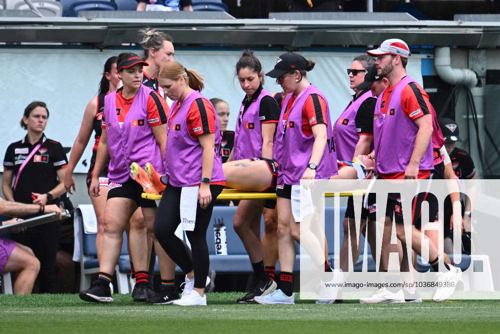 AFLW CATS BOMBERS, Amber Clarke of Essendon leaves the field with an ...