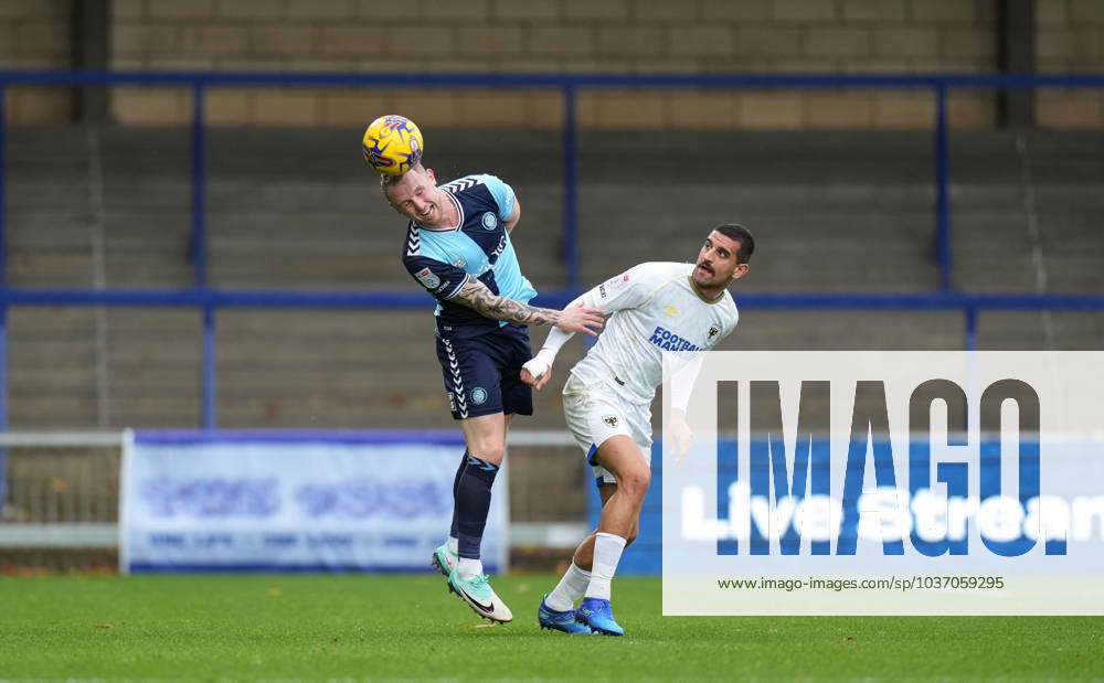 Jack Grimmer Of Wycombe Wanderers And Omar Bugiel Of AFC Wimbledon ...