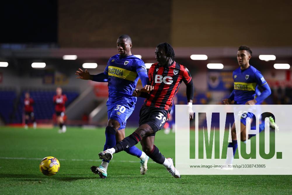 Gatlin O Donkor of Oxford United with a shot on goal under pressure ...