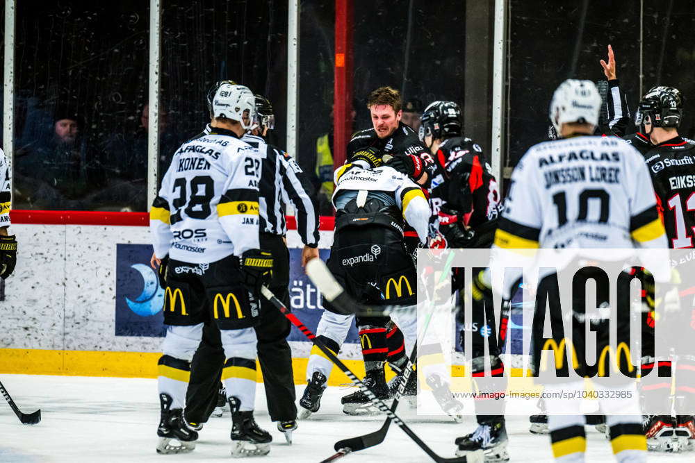 240210 Västeras Adam Hofbauer and Nybros Jesper Mangs during the ice ...