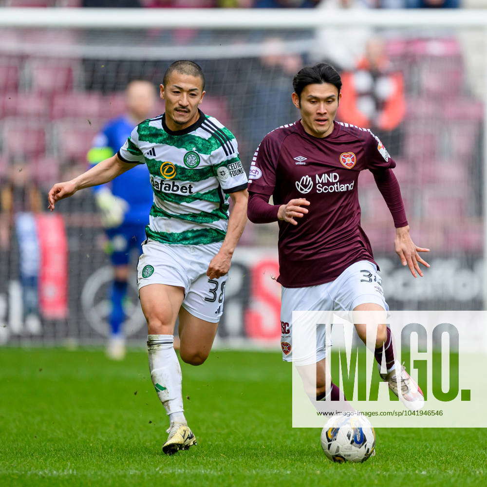 Daizen Maeda of Celtic and Kyosuke Tagawa of Hearts, Japanese players ...