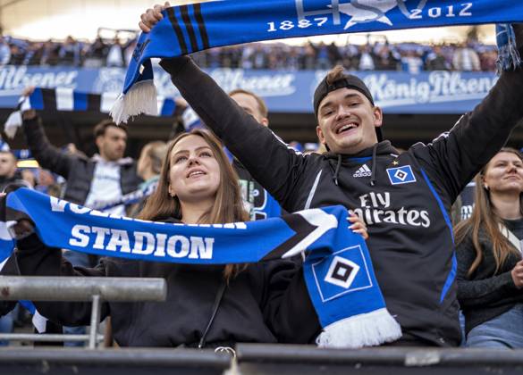 HSV fans in the south curve hold up their fan scarves 03 03 24, Hamburg ...