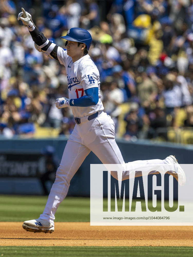 April 21, 2024, Los Angeles, California, USA: Shohei Ohtani circles the ...