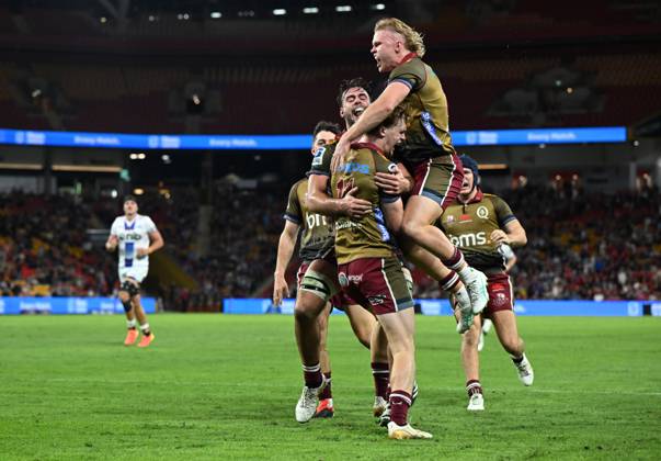 Tim Ryan Reds Rugby Player SUPER RUGBY REDS BLUES, Tim Ryan of the Reds celebrates scoring a try ...