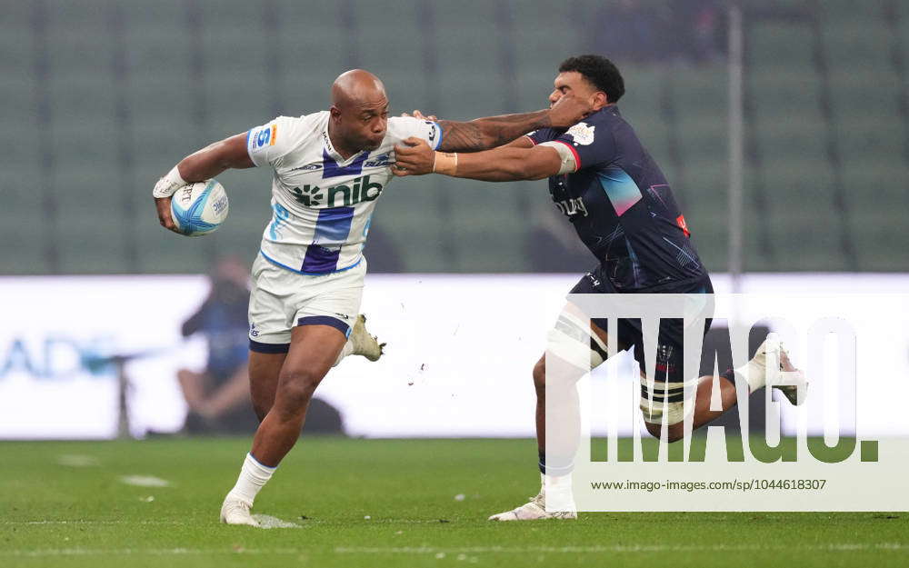 SUPER RUGBY REBELS BLUES, Sam Nock of the Blues is tackled by VaioliniI ...