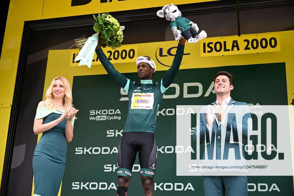 Eritrean Biniam Girmay Hailu of Intermarche-Wanty celebrates on the podium after stage 19 of the