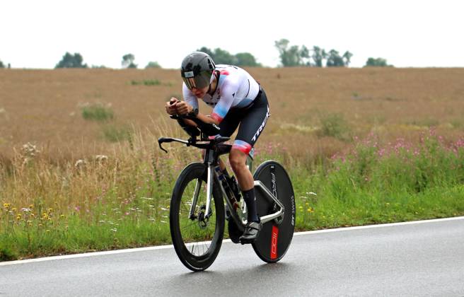Triple Ultra Triathlon Lensahn Alicja Pyszka Bazan Poland on the bike